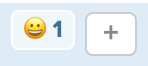 Smile emoji followed by plus sign for more emojis